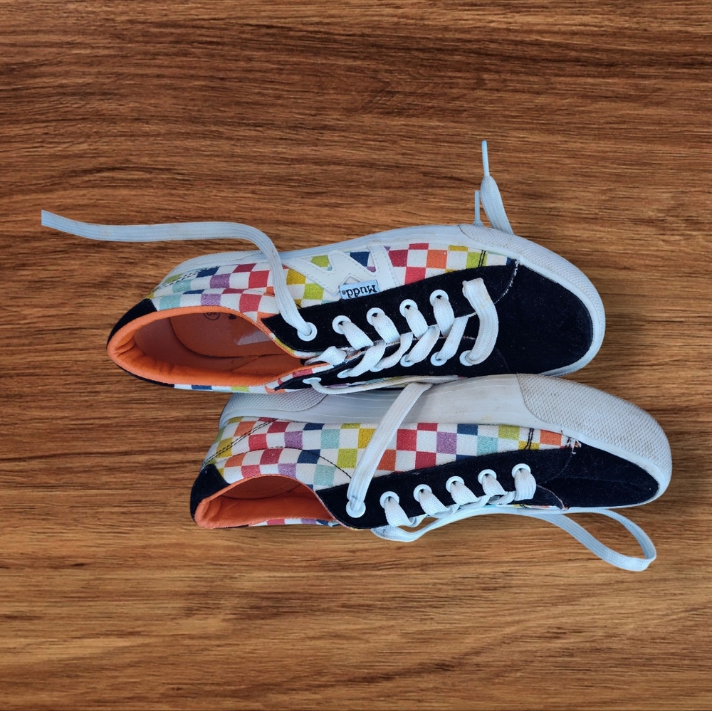 Mudd checker board sneakers run true to size.